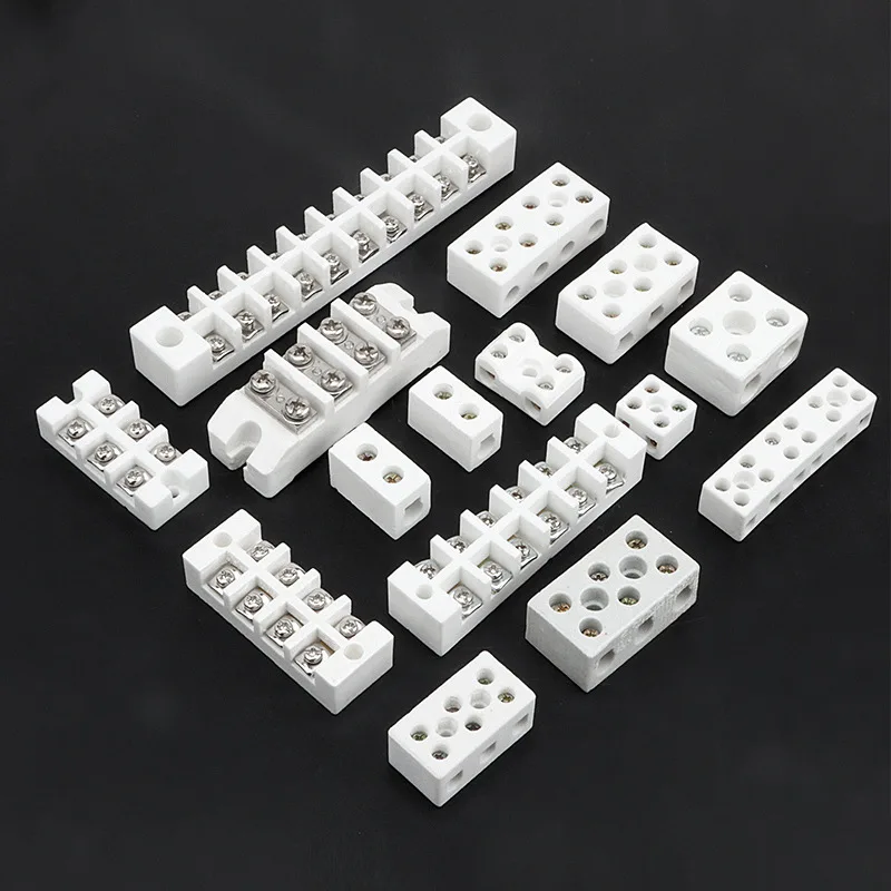 a lot white Ceramic Terminal Blocks display on the dark paper
